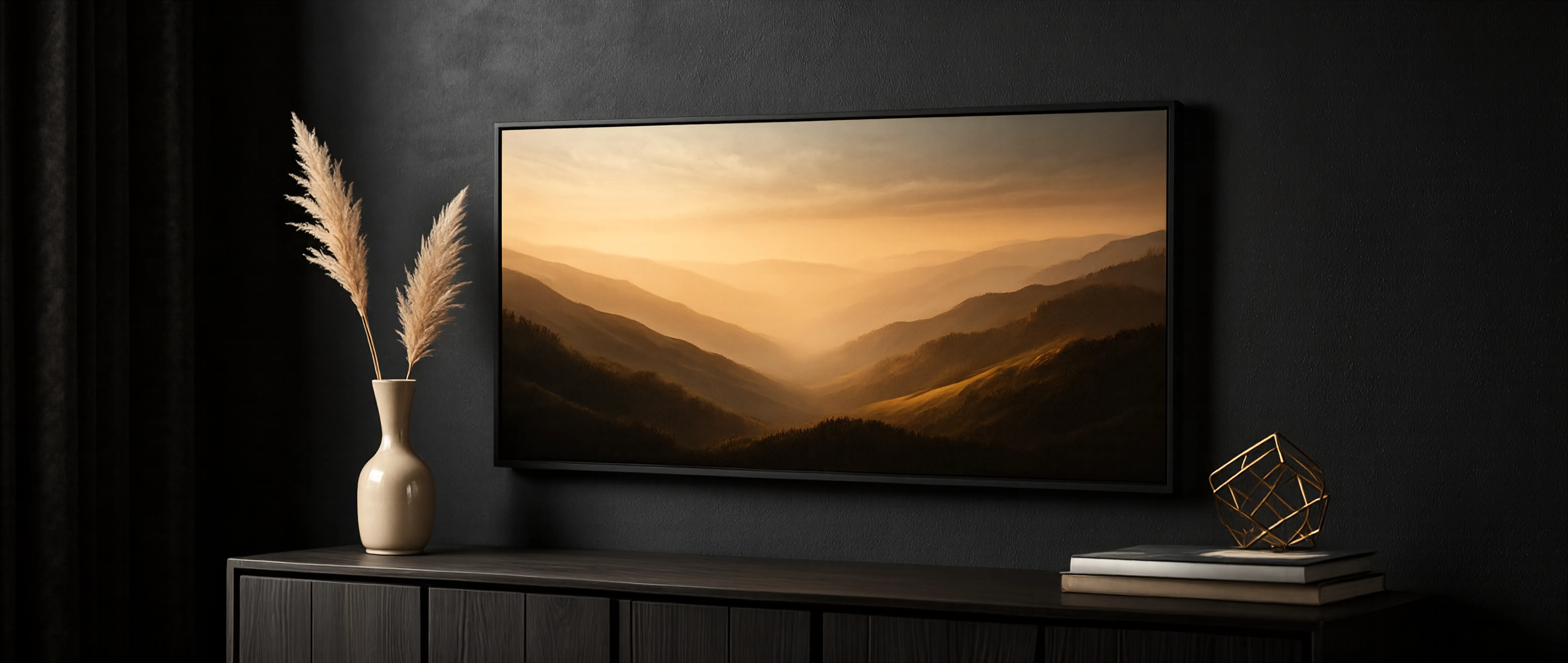 Modern interior with a premium digital art frame displaying a mountain scene, placed on a dark wooden cabinet against a black wall.